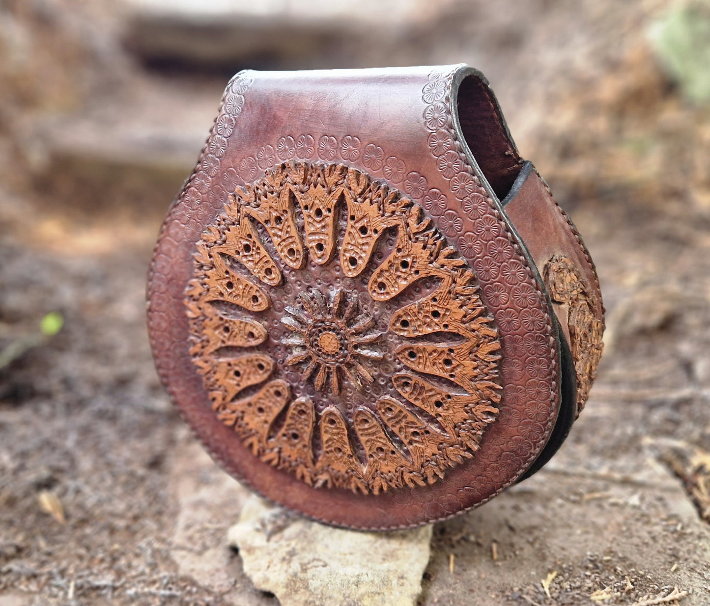 Carved leather saddlebag