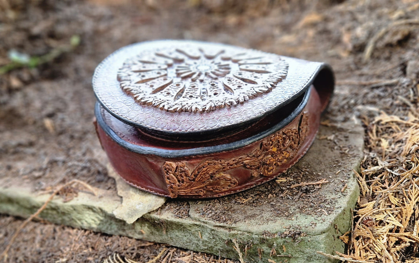 Carved leather saddlebag