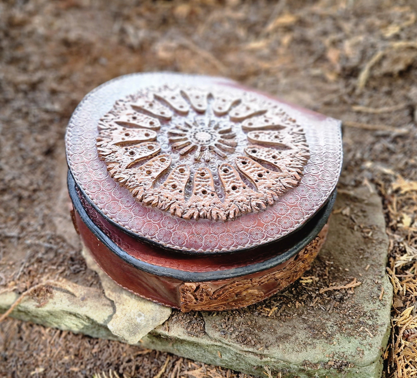 Carved leather saddlebag