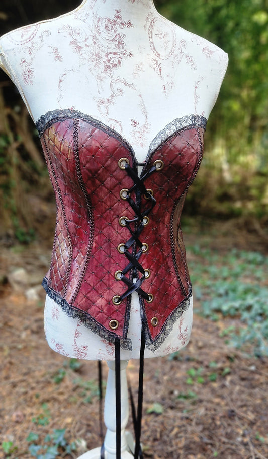 Corset, hand-tooled high quality leather with lace edging. A labour of love